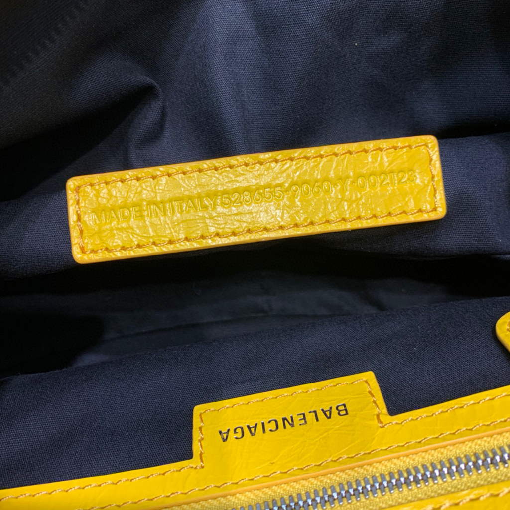 Balenciaga 67130723 Women’s Le Cagole Small Shoulder Bag Arena lambskin In Yellow Balenciaga 67130723 Women’s Le Cagole Small Shoulder Bag Arena Lambskin In Yellow