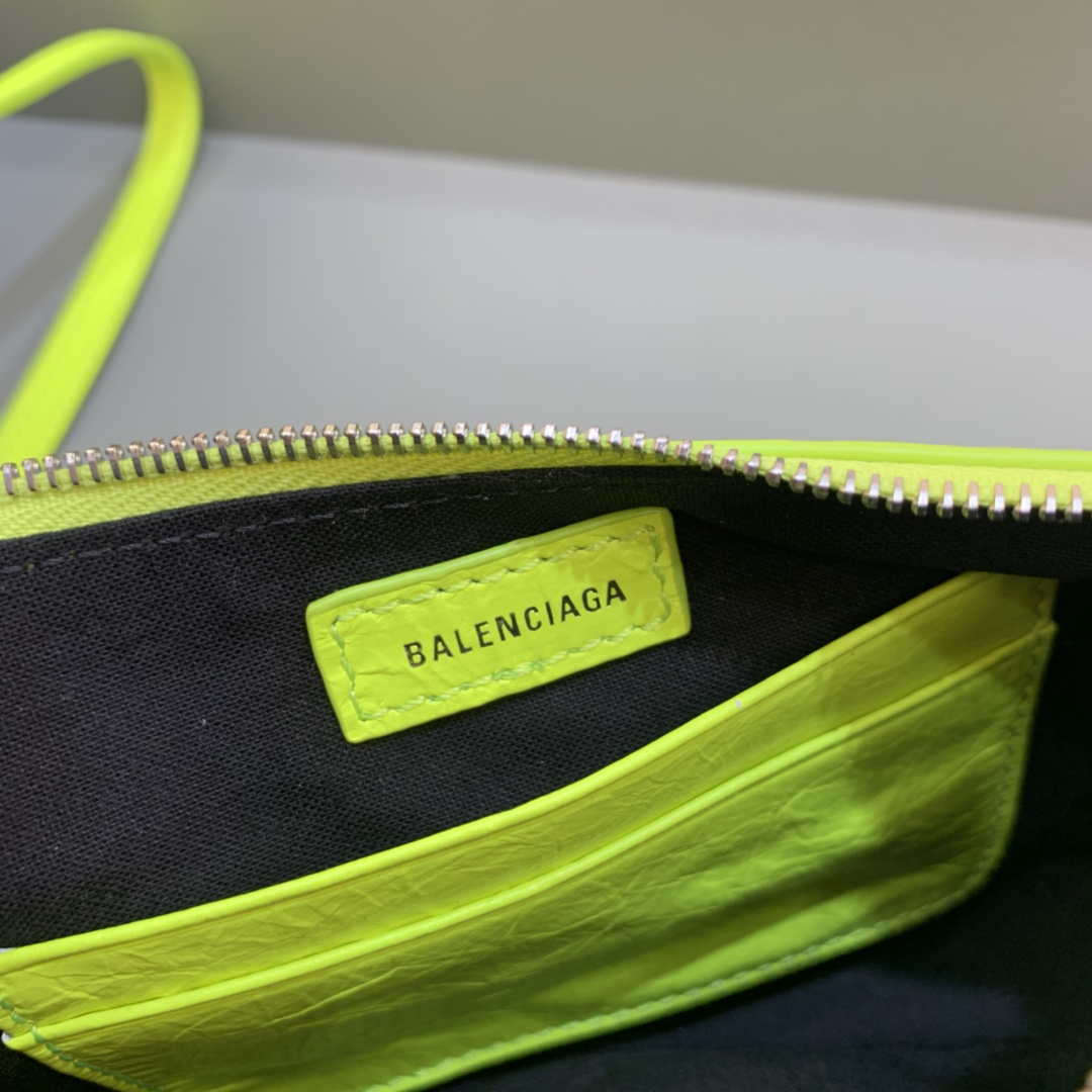 Balenciaga 6940271VG9 Le Cagole Mini Multipouch in Lemon Yellow Arena lambskin Balenciaga 6940271Vg9 Le Cagole Mini Multipouch In Lemon Yellow Arena Lambskin