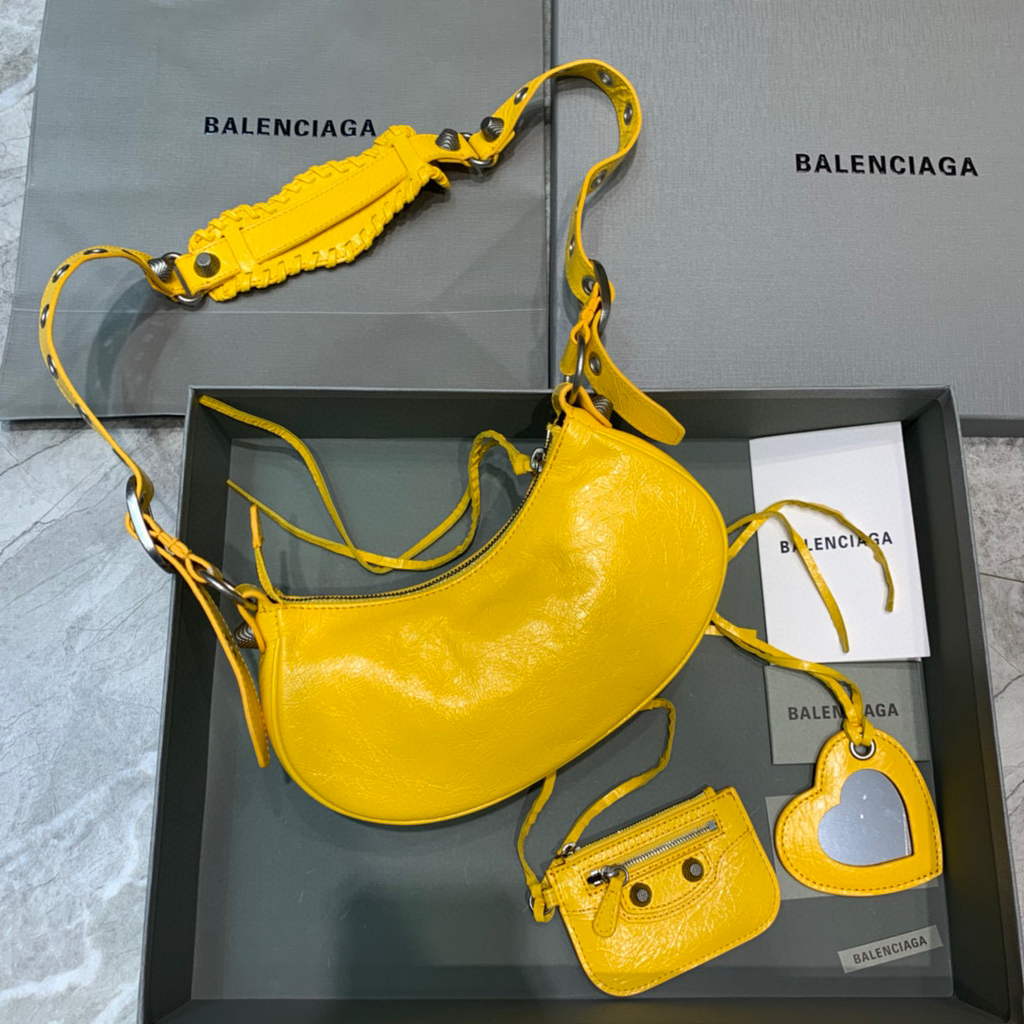 Balenciaga 700940210 Women’s Neo Cagole XS Handbag in Yellow Arena lambskin