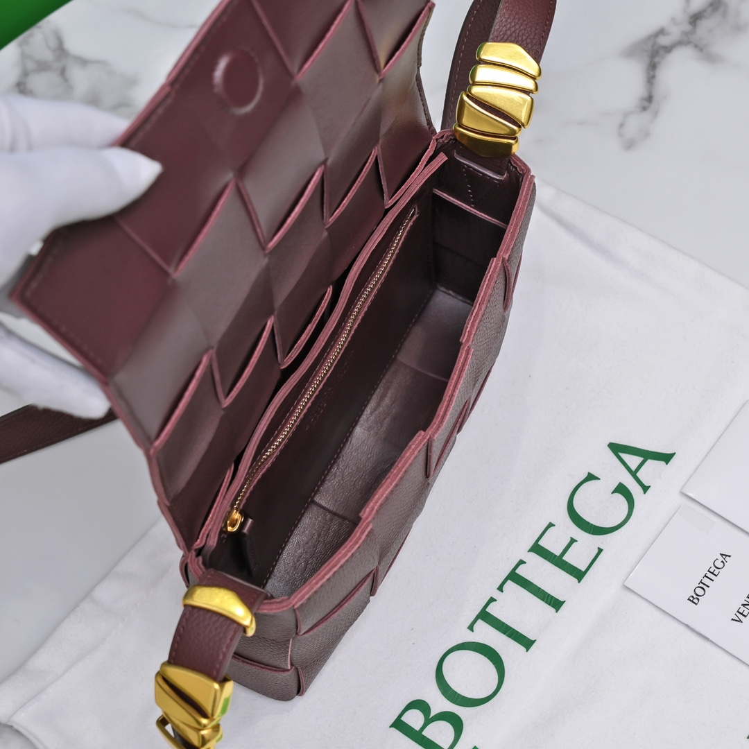 Bottega Veneta BV 666870 Cassette Intreccio grained leather cross-body bag Wine Red