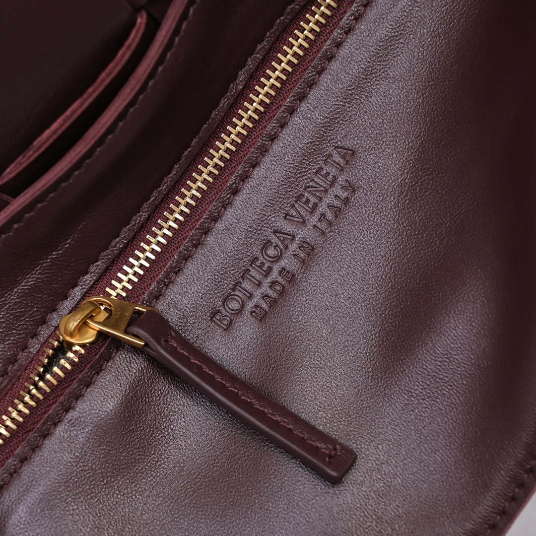 Bottega Veneta BV 666870 Cassette Intreccio grained leather cross-body bag Wine Red